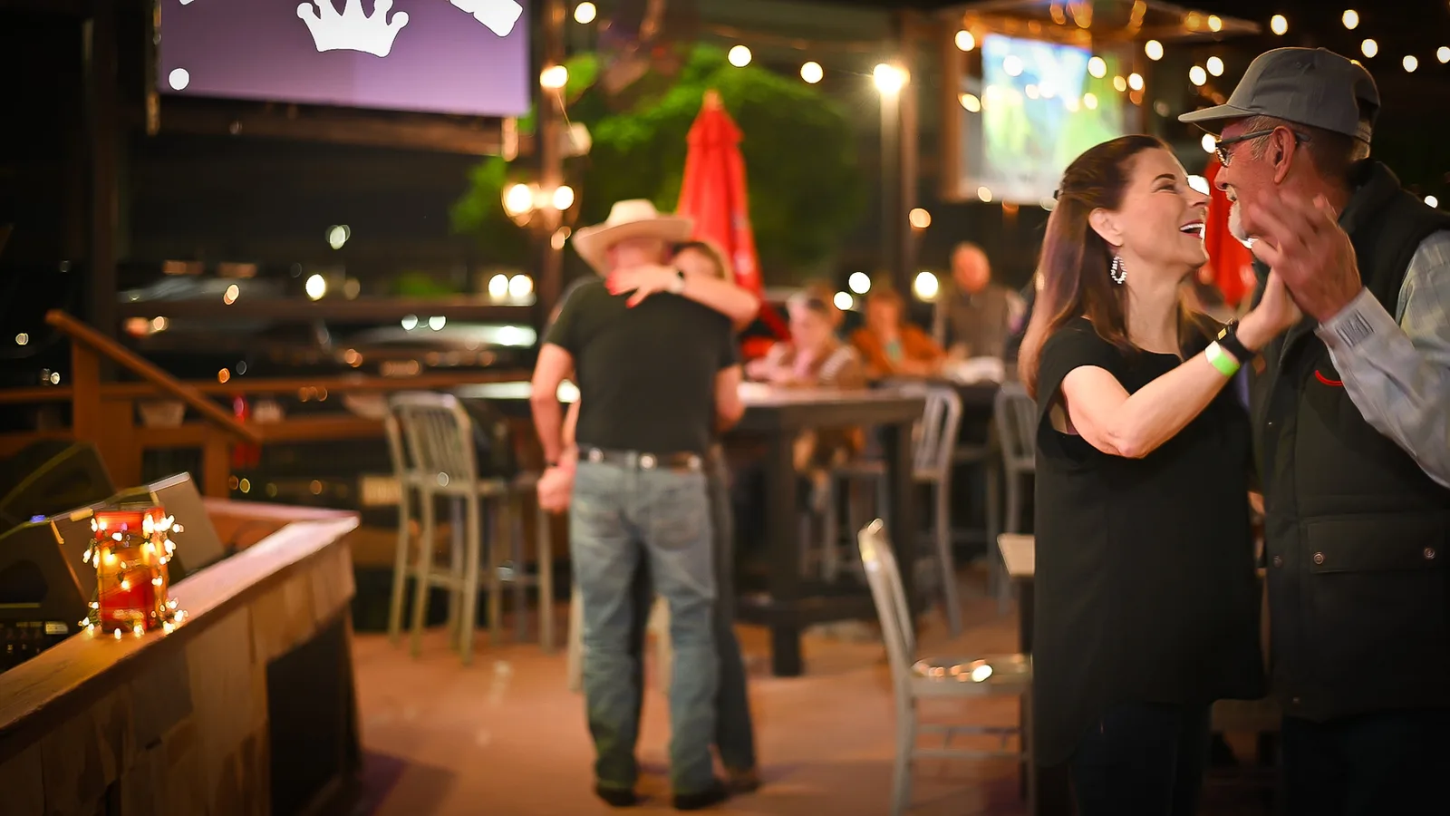 chill bars patio with customers dancing at Chill Bar & Grill in Lewisville, TX