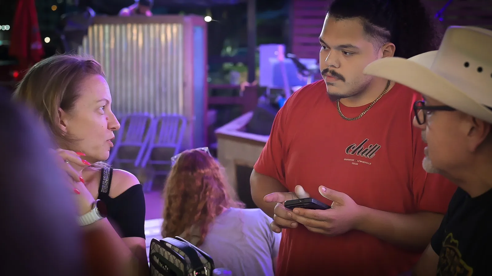chill bar server engaging with customers at Chill Bar & Grill in Lewisville, TX