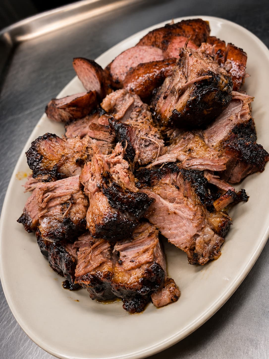 Chopped brisket and sliced sausage platter at Sammies BBQ