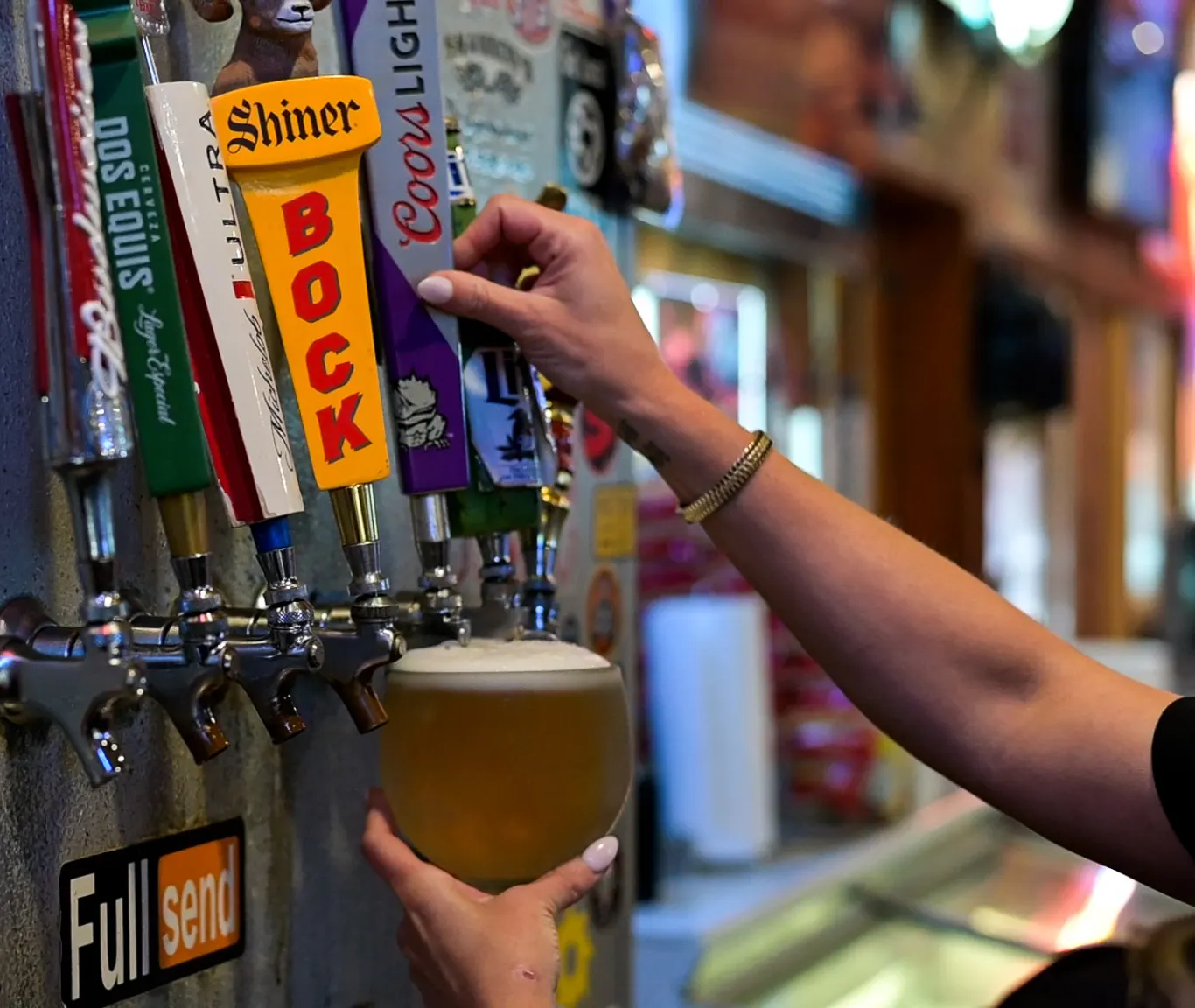 A cold draft beer poured at the Sammie's tap wall