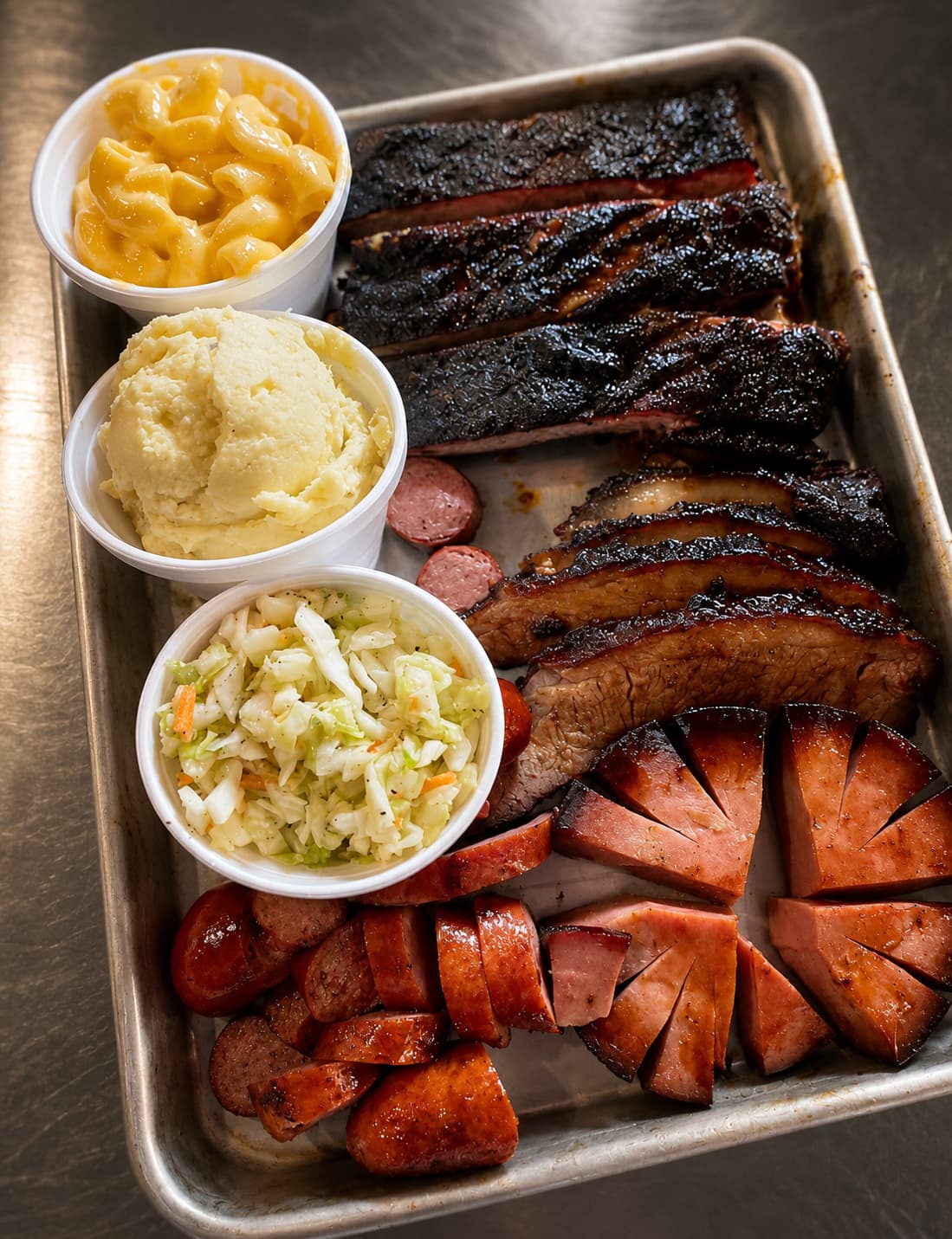 Three-meat barbecue tray with sides from Sammies BBQ