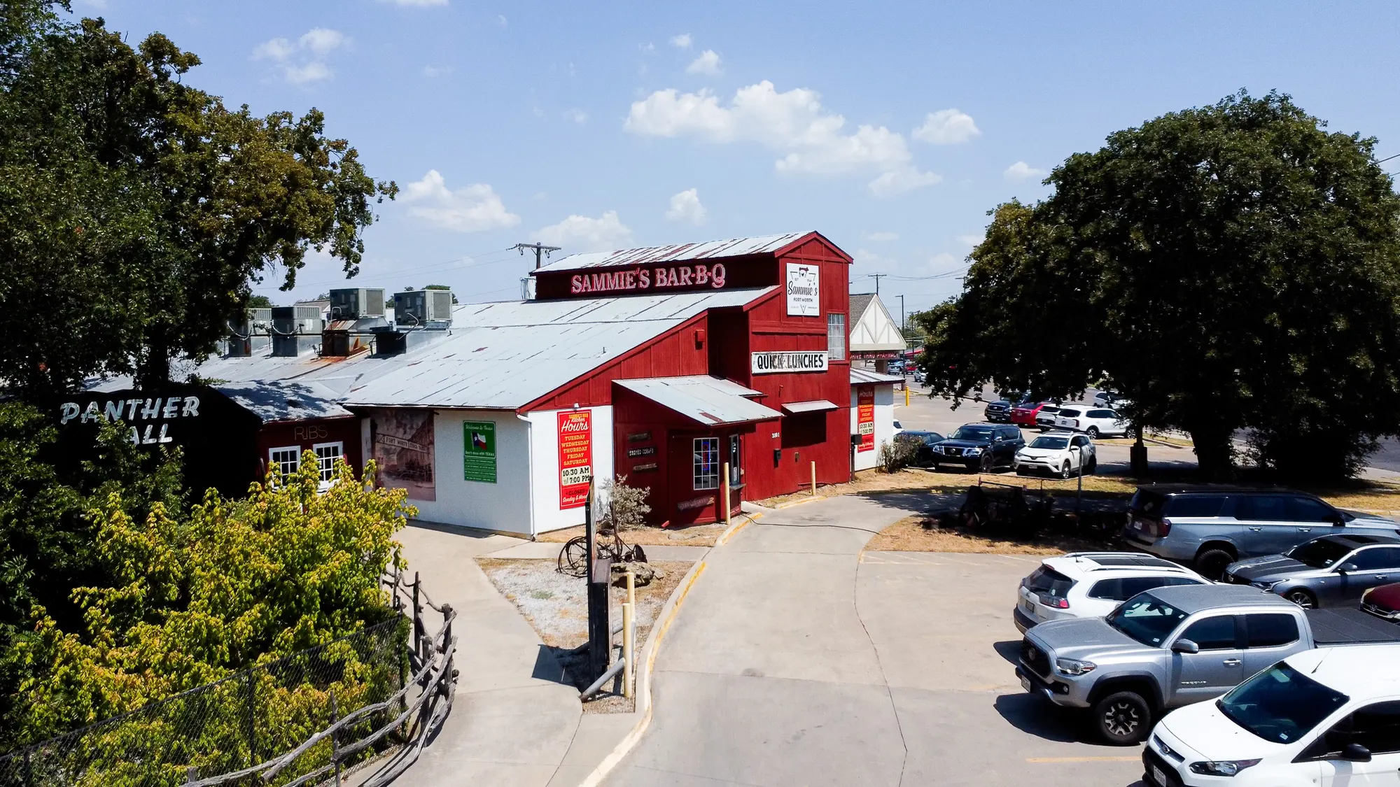 The red Sammie's Bar-B-Q building and lot on East Belknap, seen from above