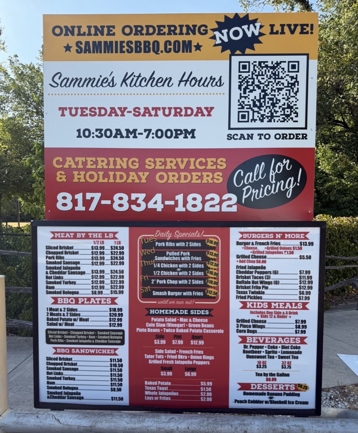 Outdoor menu board listing the full Sammie's Bar-B-Q menu