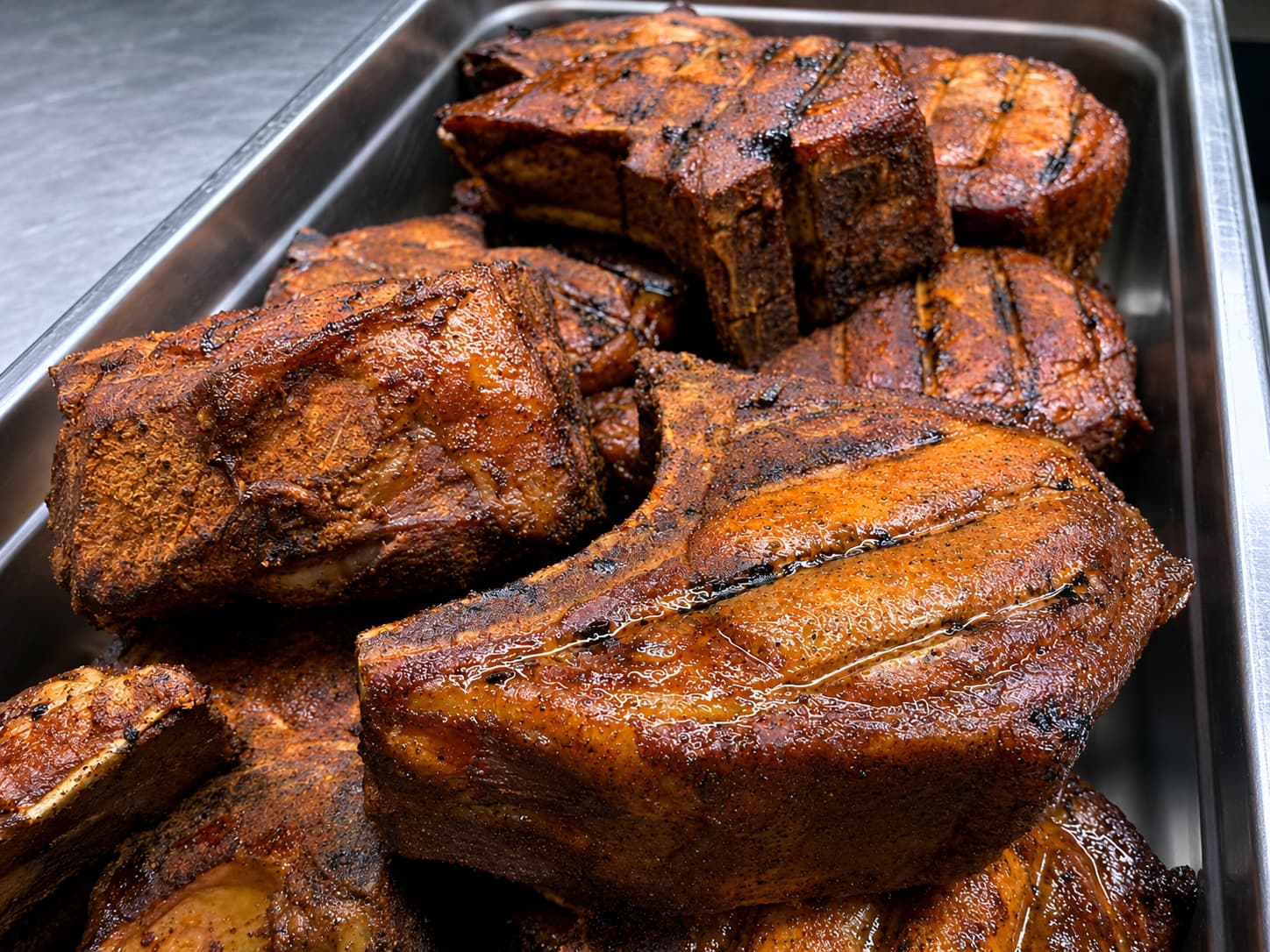 Tray of smoked pork chops fresh off the pit