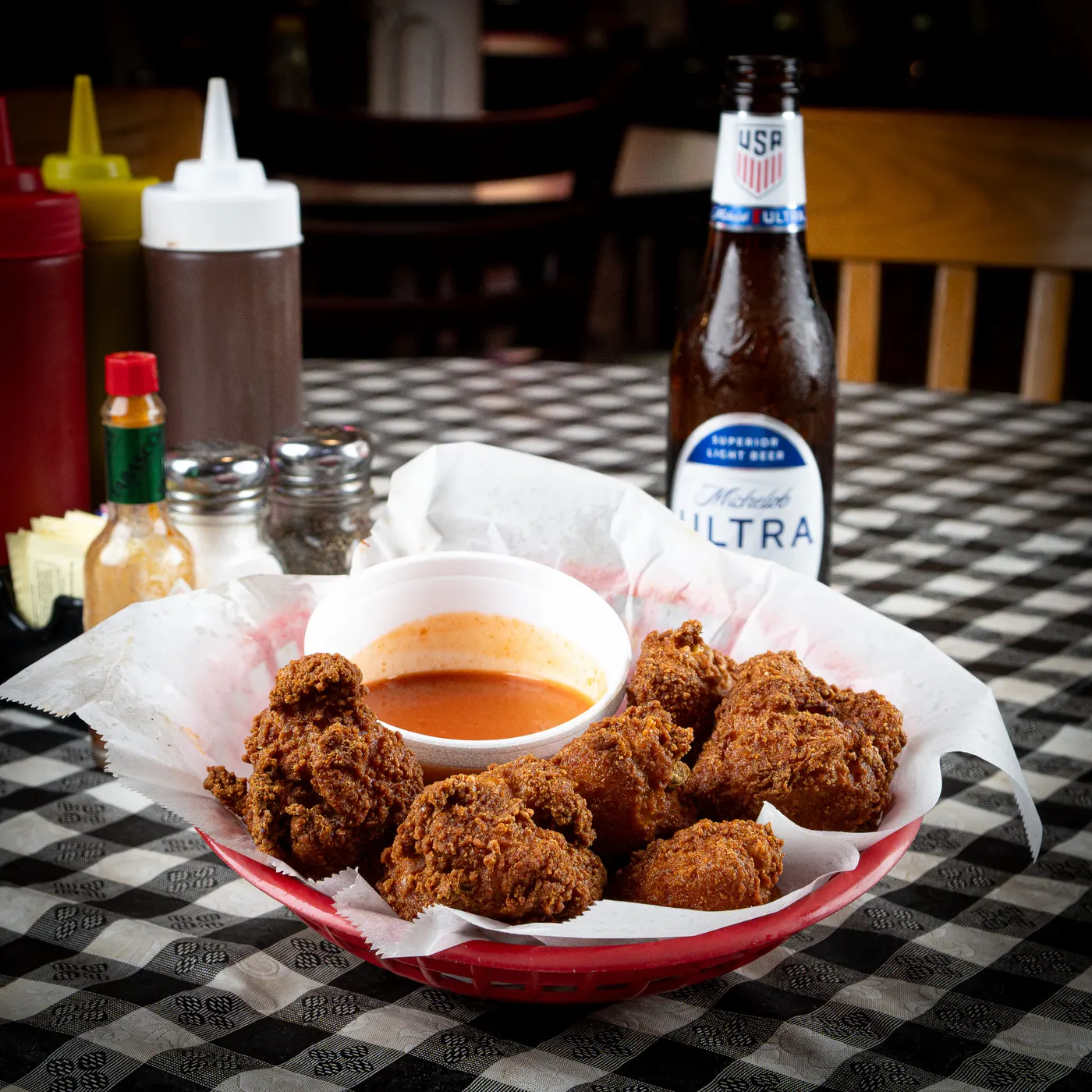 A basket of buffalo hot wings